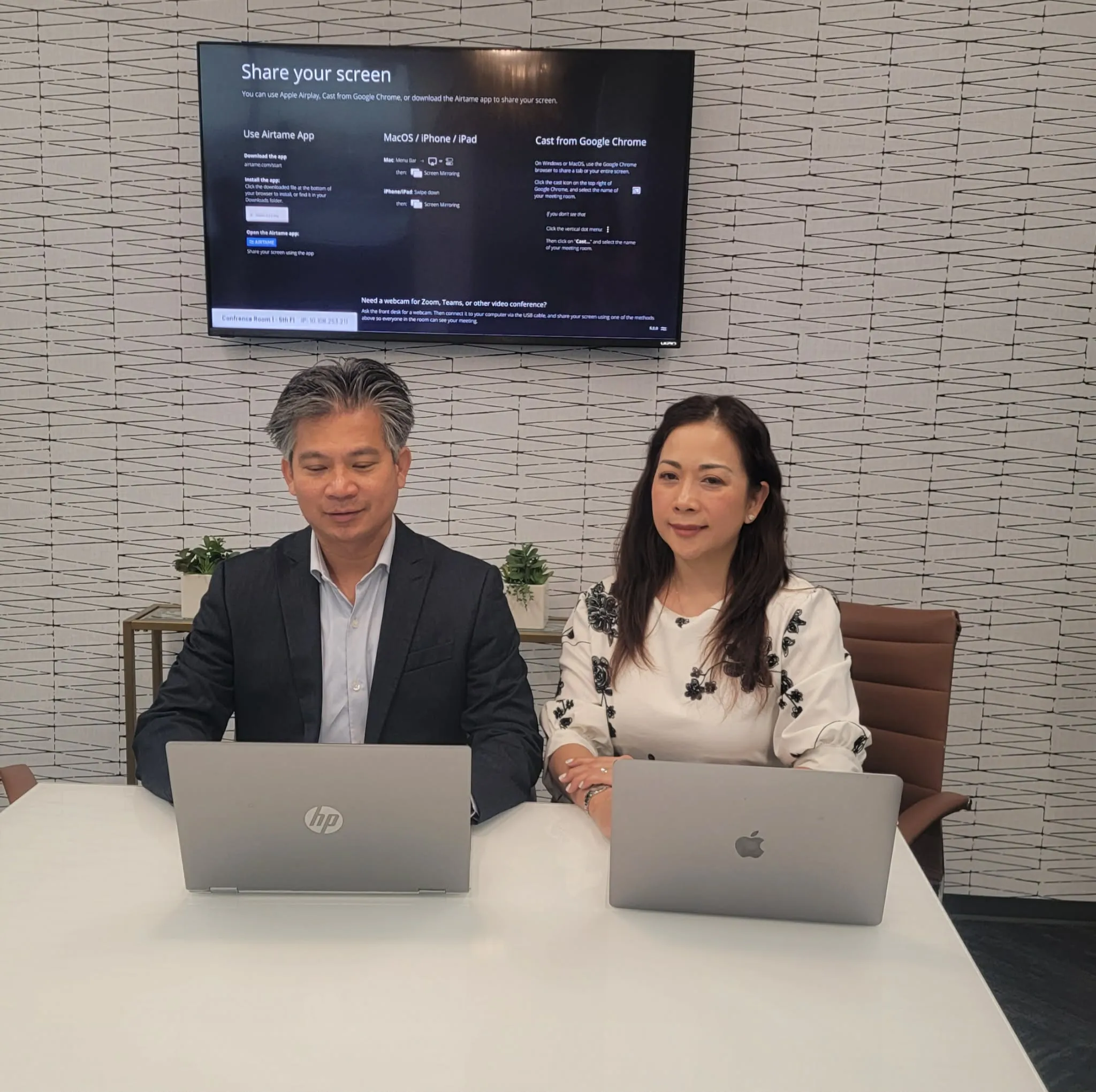 Khanh and Duyen working together on client plans