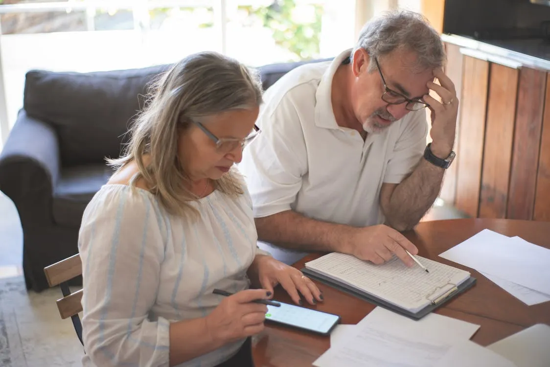 Couple reviewing their retirement plan together at home