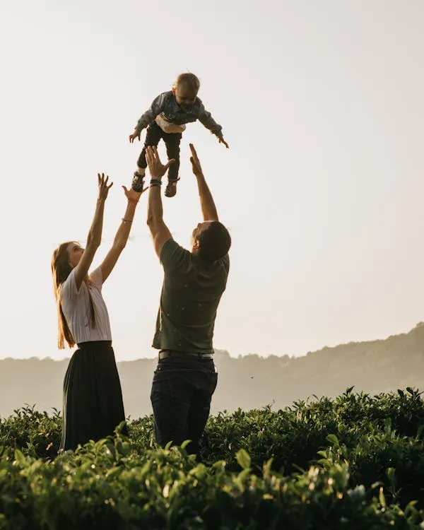 Family together outdoors — the people your decisions protect