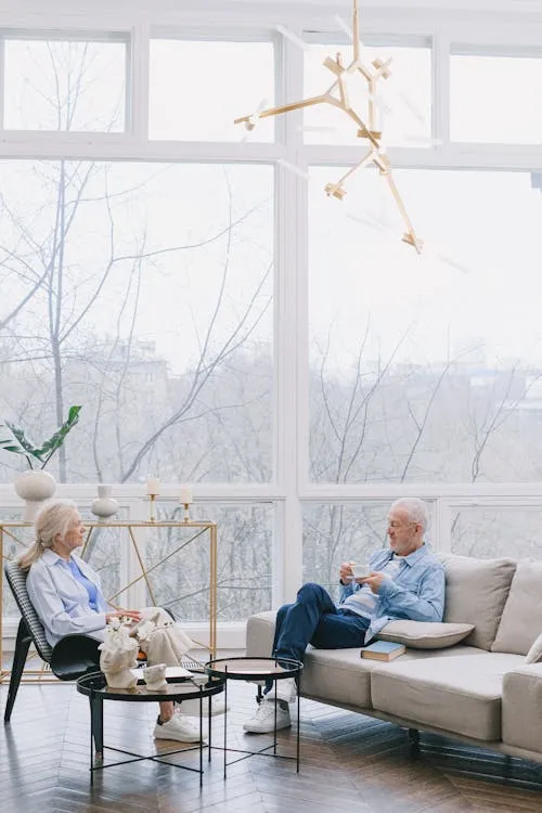 Senior couple relaxing at home — the peace of mind protection insurance provides