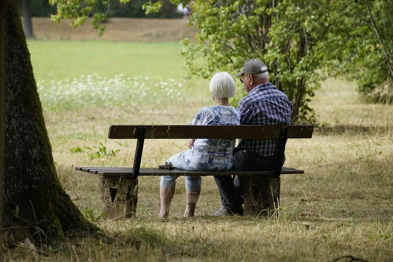 Retired couple enjoying the afternoon — income that lasts